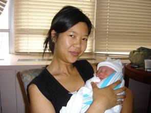Thuy Holding Nate